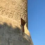 Torre *