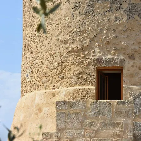 Torre *