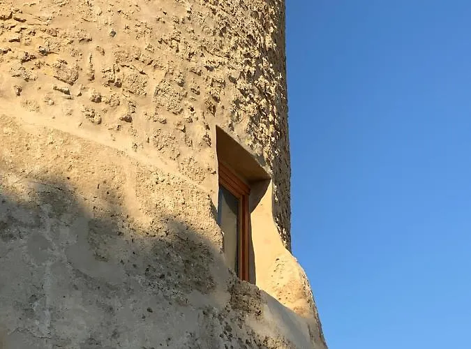 Torre *
