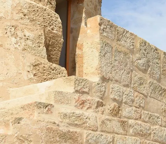 Torre *