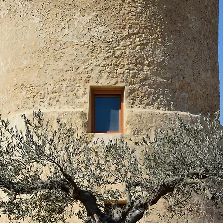 Torre *
