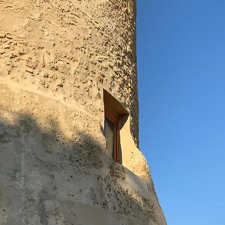 Torre *